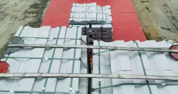 周口 芝麻白仿形加直形路沿石出货日常