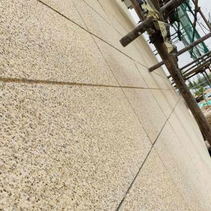 周口 黄金麻花岗岩荔枝面外墙干挂石材效果示例