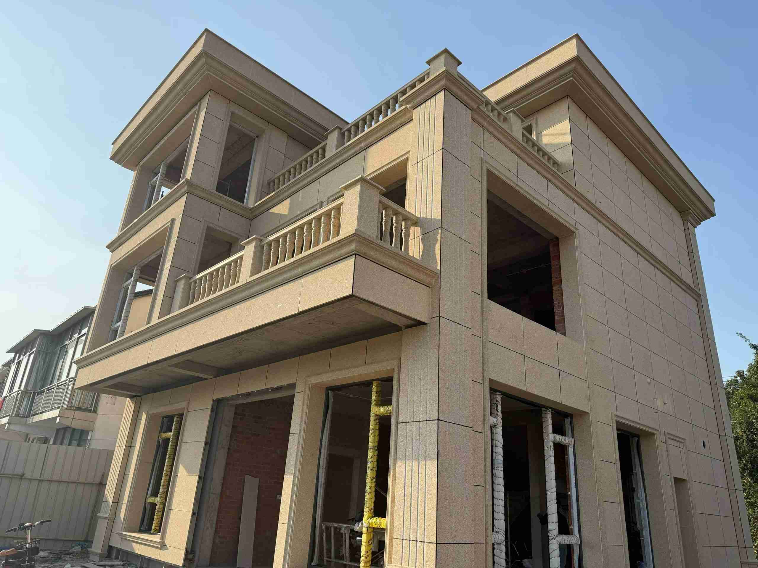 周口 黄金麻花岗岩石材荔枝面外墙干挂效果展示