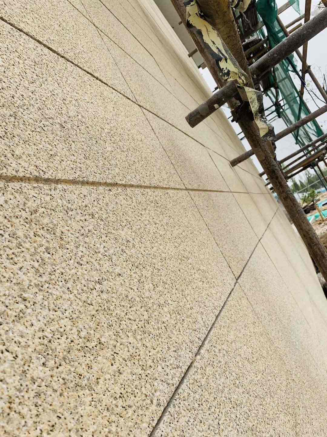 周口 黄金麻花岗岩荔枝面外墙干挂石材效果示例